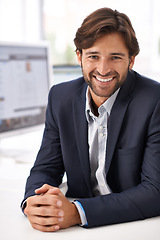 Image showing Portrait, smile and businessman at tech startup with computer, website and small business online. Professional, ux design and entrepreneur at desk with confidence, internet research and creativity.