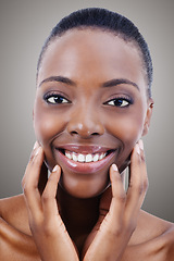 Image showing Skincare, cosmetics and portrait of black woman in studio with smile, natural makeup or facial glow. Beauty, dermatology and face of happy girl on grey background for healthy skin, shine or wellness.