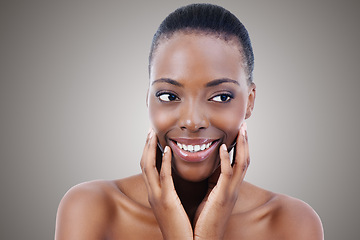 Image showing Skincare, cosmetics and face of black woman in studio with smile, natural makeup or facial on mockup space. Beauty, dermatology and happy girl on grey background for healthy skin, shine or wellness.