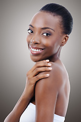 Image showing Dermatology, beauty and portrait of black woman in studio with smile, natural makeup or facial glow. Cosmetics, skincare and face of happy girl on grey background for healthy skin, shine or wellness.