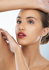 Image showing Beauty, cosmetic and woman in studio with red lipstick for natural, makeup and face routine with skincare. Self care, confident and female model with facial cosmetology treatment by background.