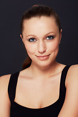 Image showing Portrait, makeup or happy woman in studio for beauty, shine or wellness treatment on black background. Cosmetic, face and female model with glowing skin confidence, smile or result satisfaction