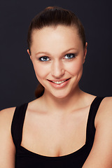 Image showing Happy woman, portrait and makeup in studio for beauty, shine or wellness treatment on black background. Cosmetic, face and female model with glowing skin confidence, smile or result satisfaction