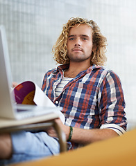 Image showing Student, reading and learning in classroom for education, language development or knowledge in university. Young man listening to lecture with books for college, laptop research or course information