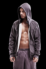 Image showing Fitness, body or fashion for thinking man in studio with hoodie for sporty, style or clothes choice on black background. Jacket, chest or guy model with cool, gym or health outfit or confidence