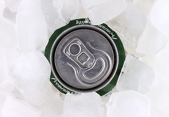 Image showing Can of beer in ice