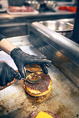 Image showing Process of cooking hamburger.