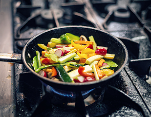 Image showing Sliced vegetables in the pan