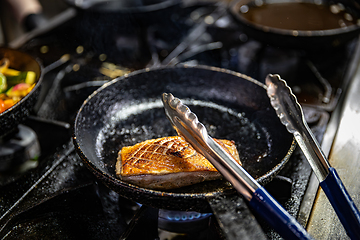 Image showing Duck breast cooking on a hot pan