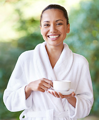 Image showing Woman, portrait and spa outdoor with coffee, hotel and bathrobe from wellness and skincare treatment. Espresso, happy and smile from tea cup and health with hospitality at lodge with luxury and care