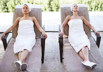 Image showing Women, spa and sleeping outdoor after massage, facial or hotel beauty treatment with rest. Relax, friends and nap from physical therapy, care and hospitality from skincare and wellness with peace