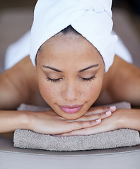 Image showing Spa, woman and sleeping on massage bed with smile for wellness, zen and beauty treatment for body care. Person, relax and physical therapy at resort, salon table and luxury on holiday or vacation