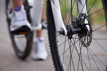 Image showing Person, bicycle and feet for fitness, road or adventure for speed, exercise and race on street in countryside. Athlete, bike and shoes for training, path and outdoor for challenge in Cape Town