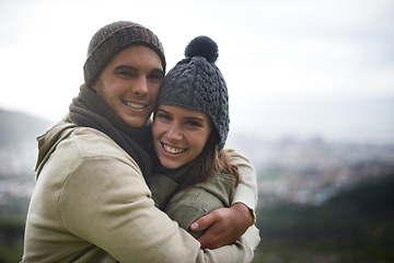 Image showing Couple, portrait and happy outdoor with hug for bonding, love and relationship with travel or holiday. Man, woman and face with embrace or smile on vacation, trip and carefree with romance and care