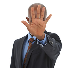 Image showing Business, black man and hand gesture in studio for stop for warning, order or threat on white background. Isolated, palm or body language with attention, danger or protest for protection or safety