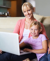 Image showing Mother, child and laptop in portrait in living room, happy and streaming subscription in apartment. Daughter, woman and face by computer for online cartoon on couch, technology and connected in house