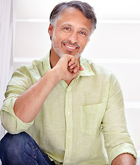 Image showing Happy man, portrait and confidence in casual clothing on staircase in relax for career ambition. Face of handsome mature male person smile sitting on steps or stairs with positive mindset on break