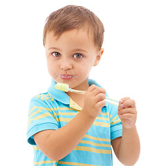 Image showing Portrait, boy and kid brushing teeth in studio for hygiene, learning healthy oral habits and care on white background. Young child, toothbrush and toothpaste for dental cleaning, fresh breath or gums