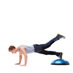 Image showing Man, ball and push up or workout in studio, core strength and fitness challenge for wellness. Male person, athlete and equipment for training, healthy body and performance or exercise by mockup