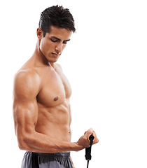 Image showing Man, fitness and bicep with resistance band in workout or training on a white studio background. Active male person or muscular model curling arm for strength, muscle or body exercise on mockup space