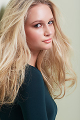 Image showing Hair care, beauty and portrait of woman in studio with growth, texture or volume on wall background. Face, hairstyle and female model pose with shampoo, treatment or conditioner, shine for results