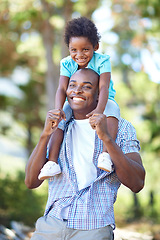 Image showing Happy father, child and piggyback in forest for family bonding, adventure or outdoor holiday in nature. African dad carrying kid on shoulders with smile for walking, support or weekend in fresh air