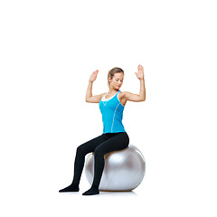 Image showing Woman, ball or body balance on a white background space for workout, wellness or mobility exercise. Female athlete training, hands up or fitness for mockup, back posture or flexibility in studio