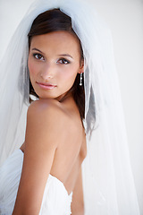 Image showing Wedding, portrait and bride with veil, makeup and fashion for celebration of marriage. Bridal, aesthetic and woman in gown for ceremony with beauty, cosmetics and confidence and pride in dress