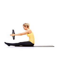 Image showing Pilates ring, arms and woman training in studio isolated on a white background mockup space. Exercise shoulders, person on mat and magic circle for fitness, balance and healthy body workout on floor