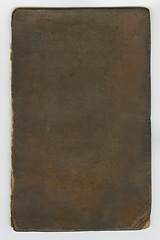 Image showing Old book, vintage and cover of antique manuscript, scriptures or ancient literature against a studio background. Closeup of blank historical novel, journal or guide in brown, dusty or classic history
