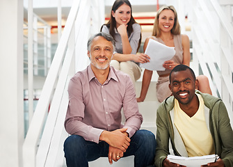 Image showing Business people, paperwork and teamwork or portrait in office, planning and collaboration on stairs. Coworkers, creative and brainstorming or problem solving, employees and communication on report