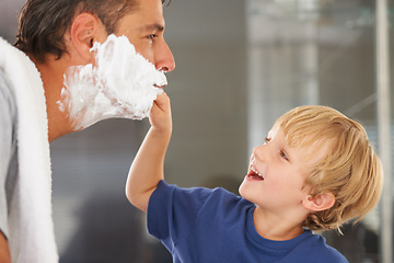 Image showing Help with shaving, dad and child with cream on face, smile and bonding in home with morning routine. Teaching, learning and father with happy son in bathroom for shave, clean fun or grooming together
