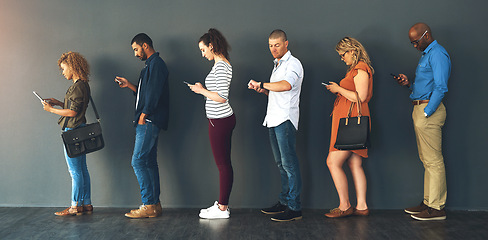 Image showing Businesspeople, interview and waiting in queue with technology or job recruitment, onboarding or internet. Men, women and meeting diversity in line or cellphone in office, human resources or hiring