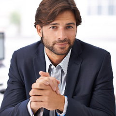 Image showing Portrait, office and businessman at desk with confidence, commitment and small business owner at startup. Professional career, happy face and entrepreneur with pride, project management and smile.