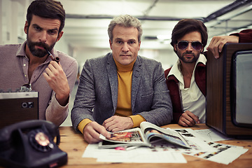 Image showing Group, men and meeting for fashion magazine company with retro planning in office. Vintage, style and colleagues planning journalist design and media production with publishing agency teamwork