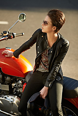 Image showing Motorcycle, thinking and woman in city with sunglasses for travel, transport or road trip as rebel. Fashion, leather and model with attitude on classic or vintage bike for transportation or journey