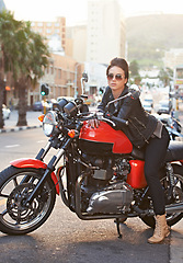 Image showing Motorcycle, leather and woman in city with sunglasses for travel, transport or road trip as rebel. Fashion, street and model with attitude on classic or vintage bike for transportation or journey