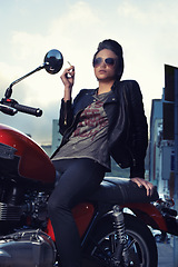 Image showing Motorcycle, cigarette and woman smoking in city for travel, transport or road trip as rebel. Fashion, tobacco or nicotine and biker with attitude on classic or vintage bike for urban journey