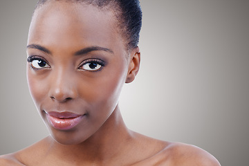 Image showing Skincare, mockup and portrait of black woman in studio with smile, natural makeup or facial. Cosmetics, dermatology and face of happy girl on grey background space for healthy skin, shine or beauty.
