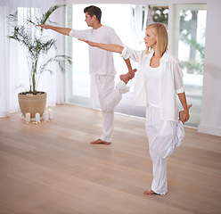 Image showing Yoga, stretching and couple do pilates in home for wellness, mindfulness and training. Fitness, exercise and man and woman balance in house for bonding, healthy body and workout together in morning