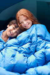 Image showing Happy, portrait and children hug with blanket for camping, comfort and bonding outdoor together. Family, love and face of kids outside for journey, fun or adventure in a forest for vacation sleepover