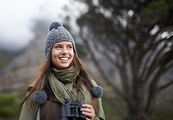Image showing Happiness, binocular and nature woman on hiking journey, travel adventure or relax walk. Mockup space, trekking woods and hiker smile for jungle exploration, bird watching and looking at outdoor view