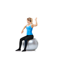 Image showing Woman, arms or ball balance on a white background space for workout, wellness or mobility exercise. Female athlete training, hands or fitness pose for mockup, body posture or flexibility in studio