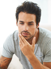 Image showing Thinking, face and man in a house with calm, memory or peaceful moment of reflection. Idea, questions and male person at home with insight, planning or enjoying a quiet day off, weekend or morning