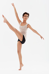 Image showing Dance, ballet and portrait of girl in studio for performance, fitness and training for theatre. Ballerina, young dancer and isolated person for balance, routine and practice on white background