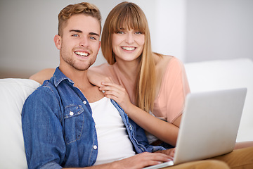 Image showing Happy couple, portrait and relax with laptop on sofa, watch movies and streaming with subscription in home. Smile, man and woman on couch with computer on website, blog or social media on internet