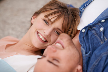 Image showing Portrait, couple and love with care while lying down for affection at home. Man, woman and relax in relationship with bonding and romance in a calm and peaceful house for leisure with smile on floor