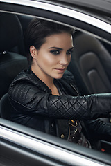 Image showing Woman, car and view while driving on a journey or adventure in a luxury vehicle. Female person, roadtrip and steering wheel of a transportation motor for confidence on a travel destination trip