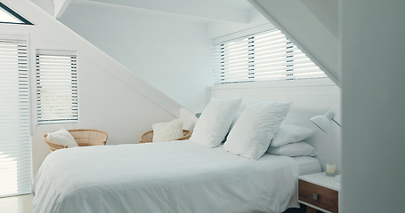 Image showing Empty bedroom, house and furniture for holiday, vacation and accommodation in hotel or apartment interior design. Bed, home and hospitality with white pillow, blanket and duvet for comfort or getaway