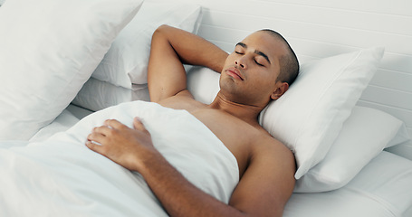 Image showing Man, eyes closed and sleeping in bed at home, peace and dreaming or relax on sunday morning. Male person, comfortable and blanket for resting, lazy and house nap on soft bedding and calm on weekend